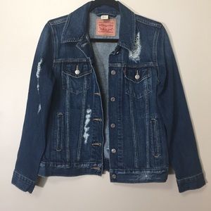 Distressed torn thrashed Levi’s denim jean jacket
